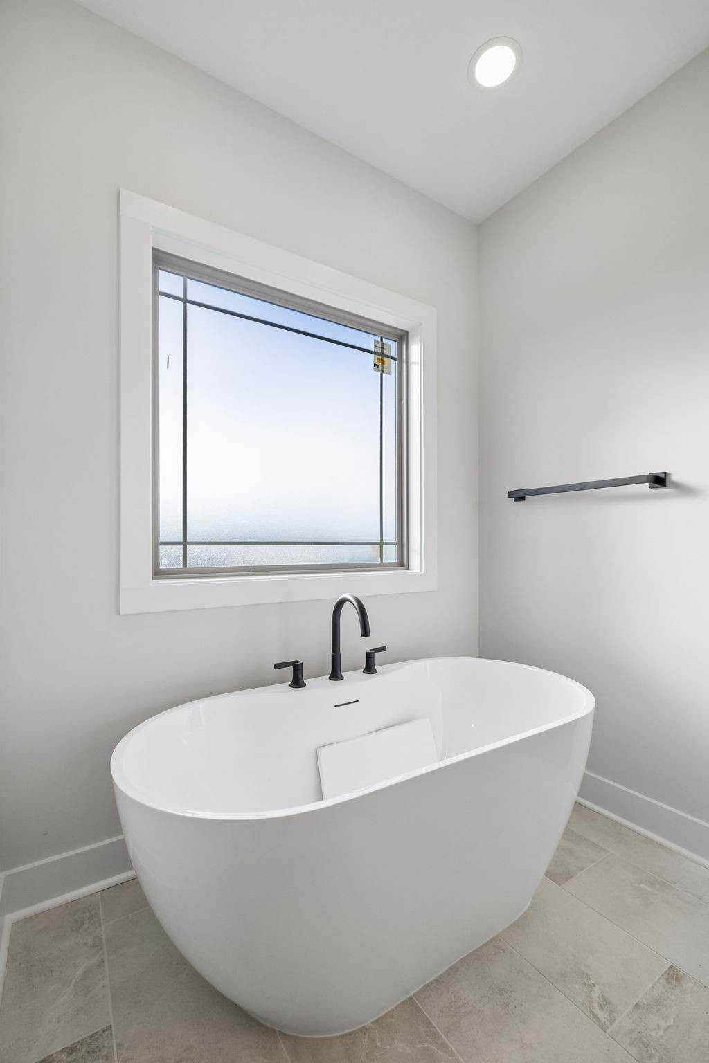 1015 Linder Ridge Road Woodlawn, TN 37191 - Photo 29 of 55 a white bath tub sitting in a bathroom