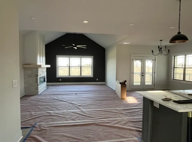 a view of an empty room and window