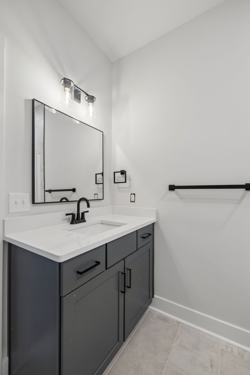 1015 Linder Ridge Road Woodlawn, TN 37191 - Photo 38 of 55 a bathroom with a sink and a mirror