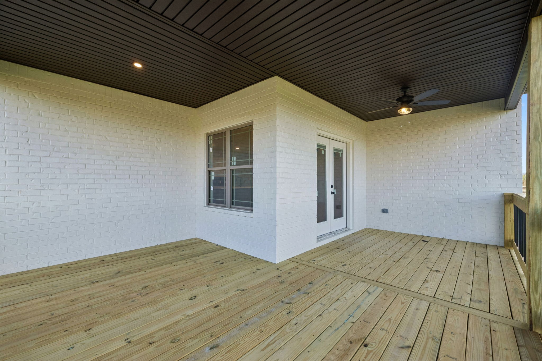 1015 Linder Ridge Road Woodlawn, TN 37191 - Photo 40 of 55 a big room with wooden floor