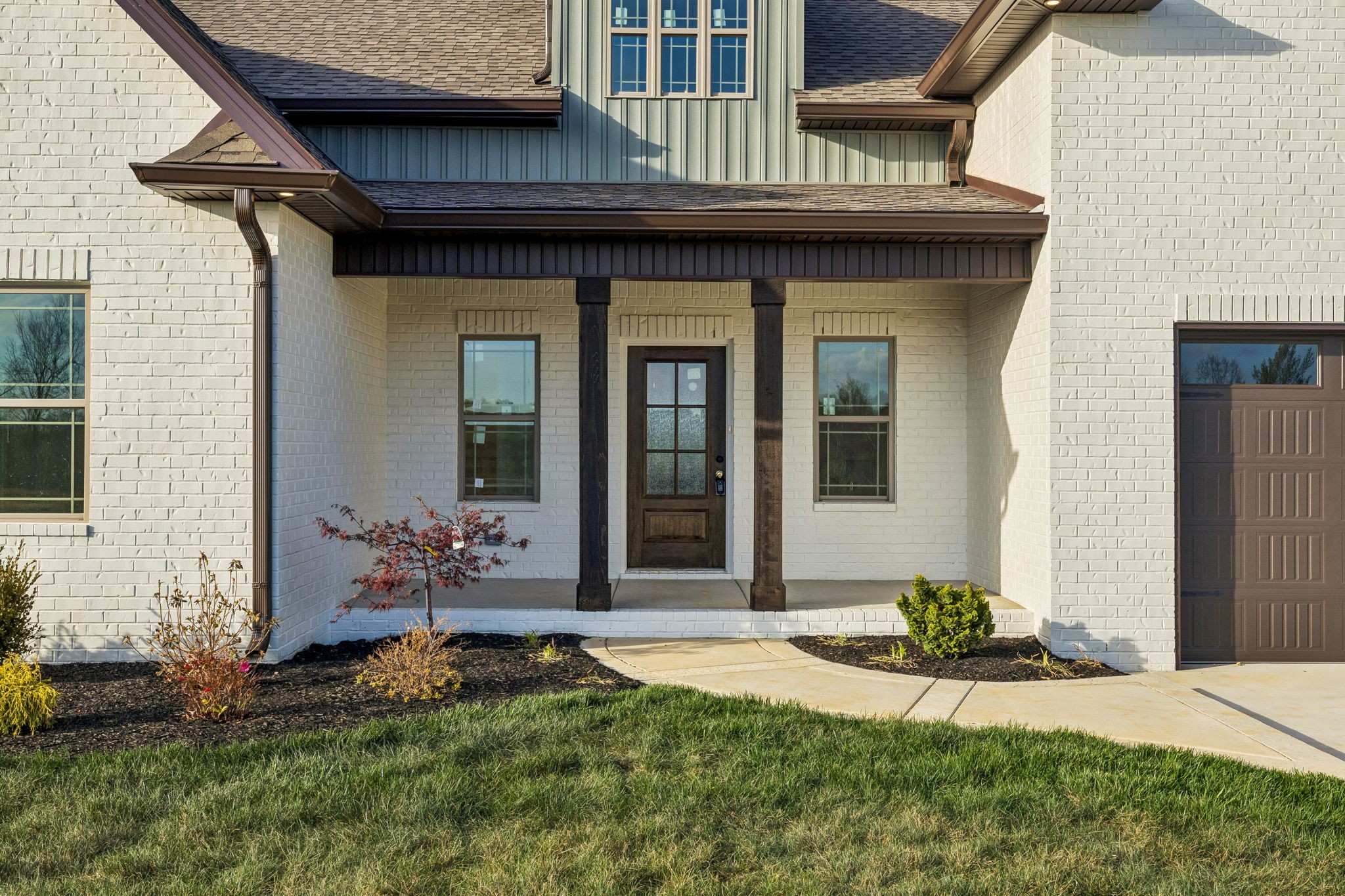 1015 Linder Ridge Road Woodlawn, TN 37191 - Photo 4 of 55 a front view of a house with a yard