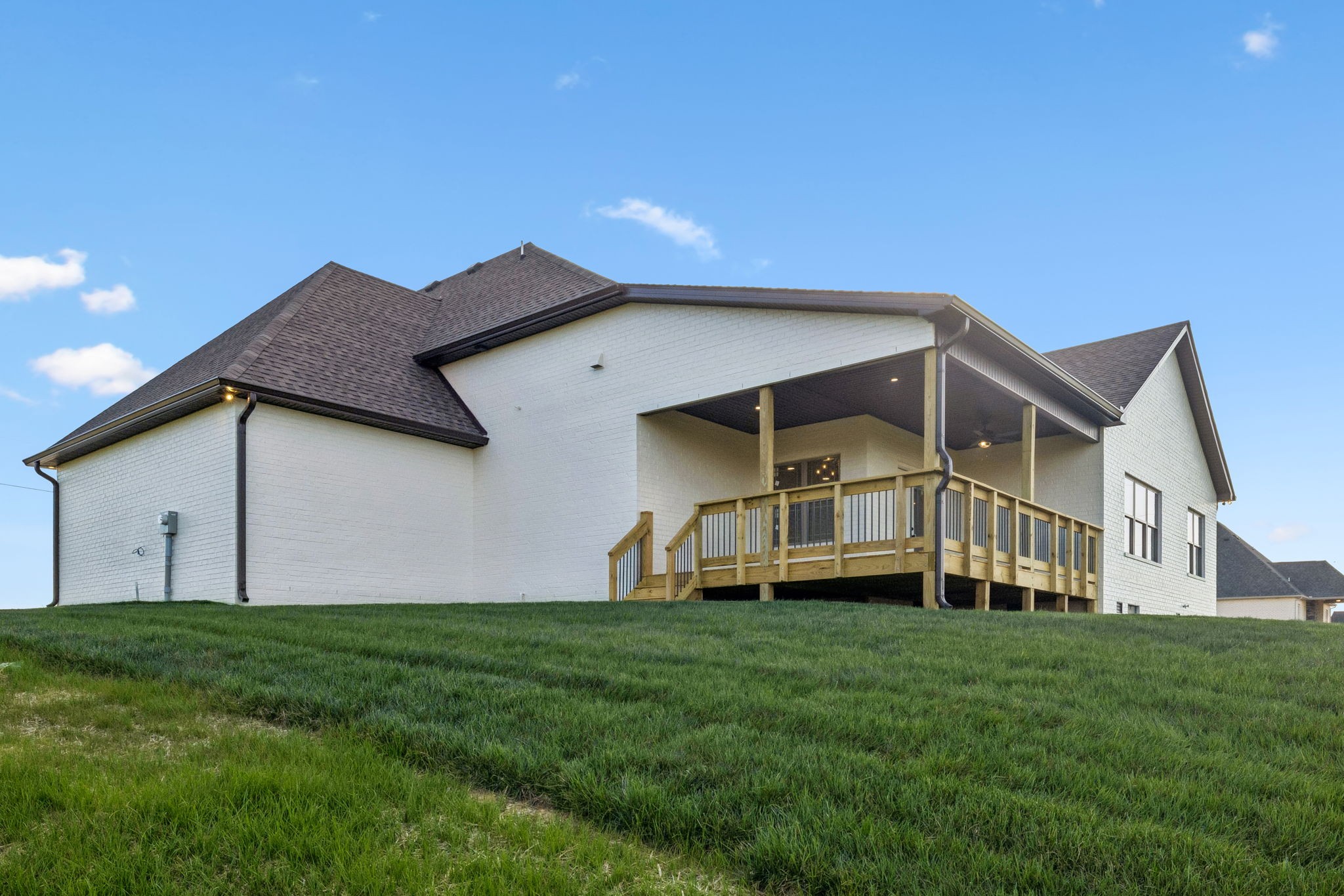 1015 Linder Ridge Road Woodlawn, TN 37191 - Photo 45 of 55 a front view of a house with a yard and garage