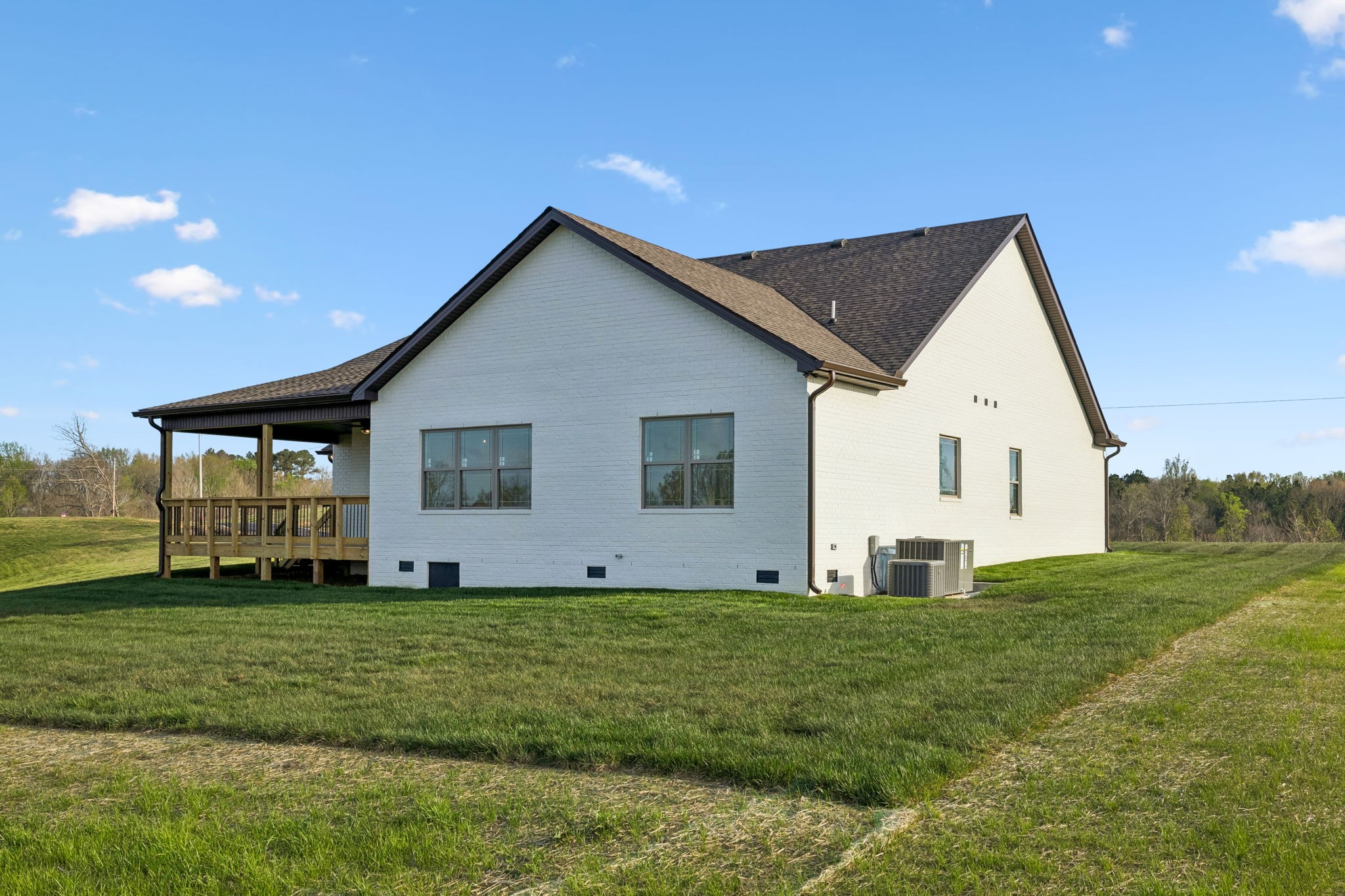 1015 Linder Ridge Road Woodlawn, TN 37191 - Photo 48 of 55 a view of a house with a yard