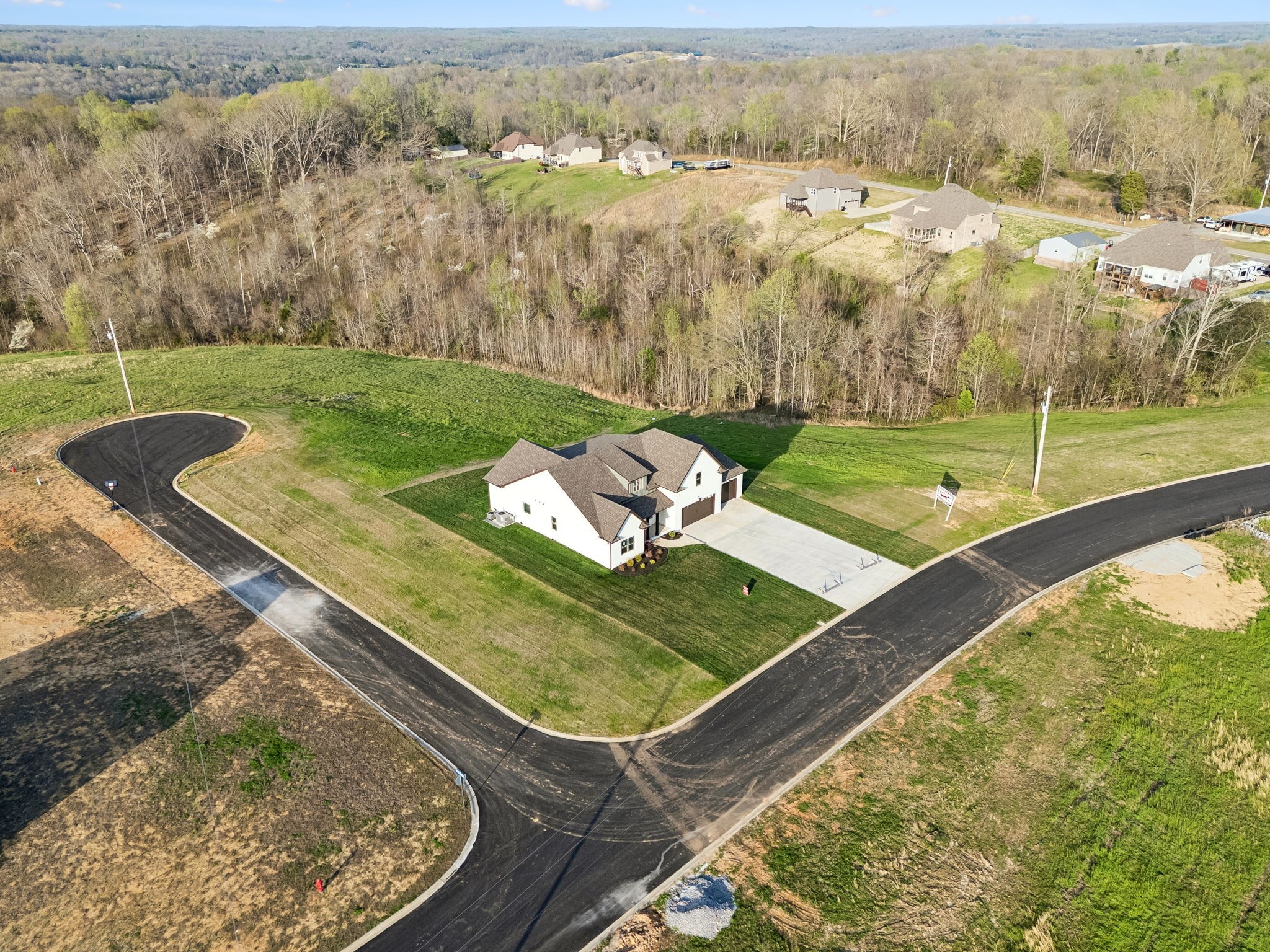 1015 Linder Ridge Road Woodlawn, TN 37191 - Photo 50 of 55 a view of a backyard with a barn