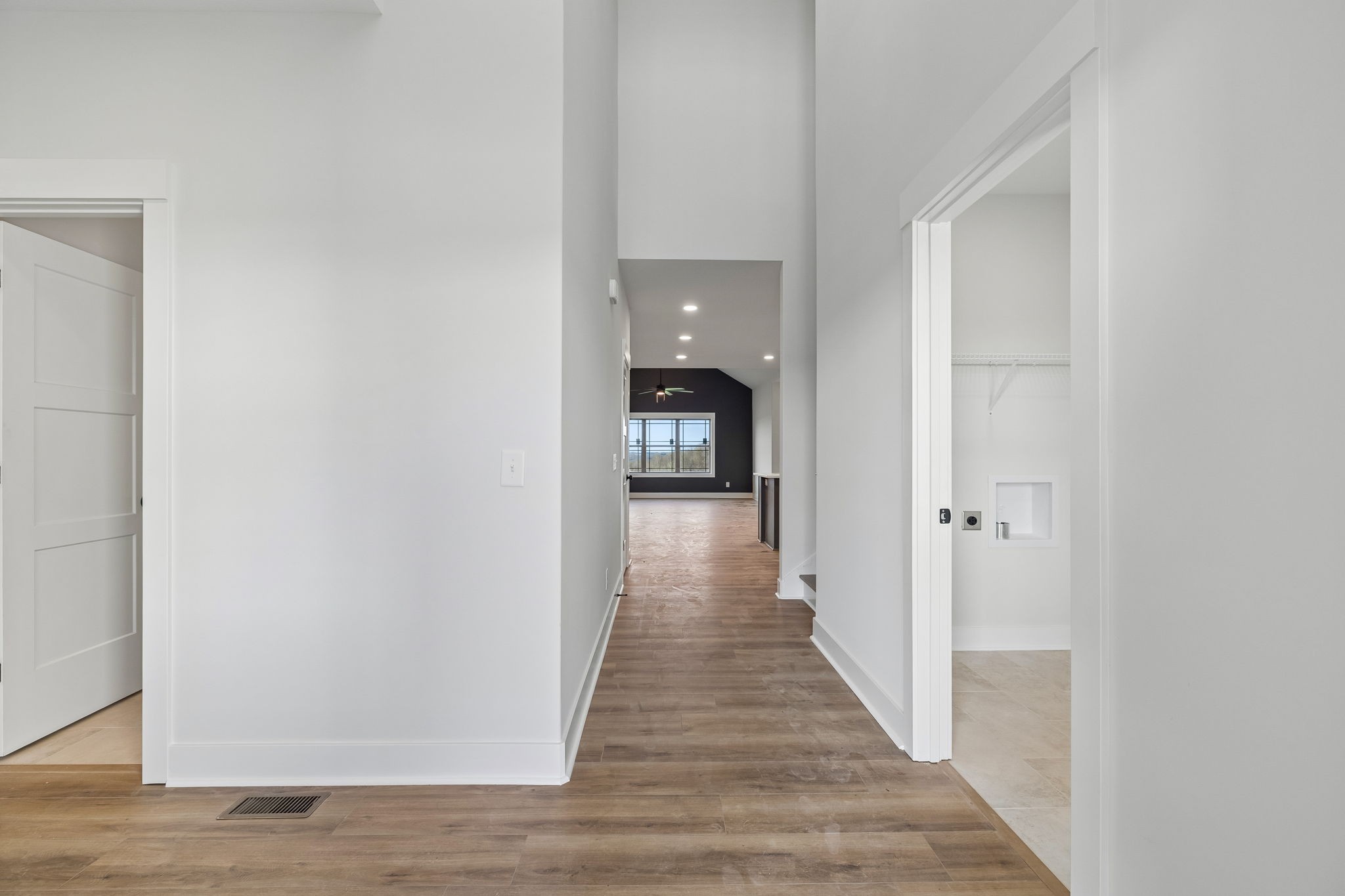 1015 Linder Ridge Road Woodlawn, TN 37191 - Photo 5 of 55 a view of a hallway with wooden floor