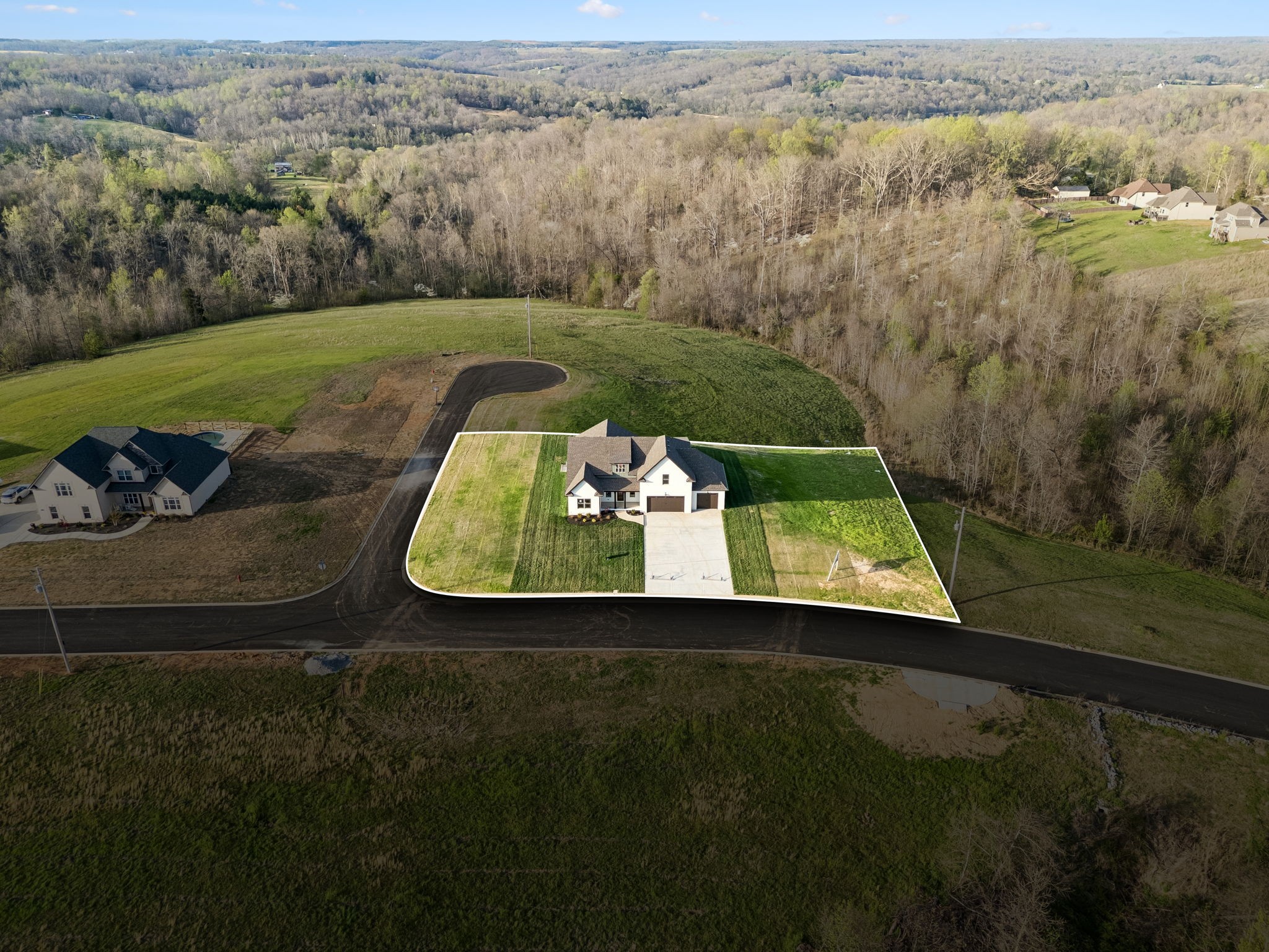 1015 Linder Ridge Road Woodlawn, TN 37191 - Photo 51 of 55 an aerial view of a house with a yard