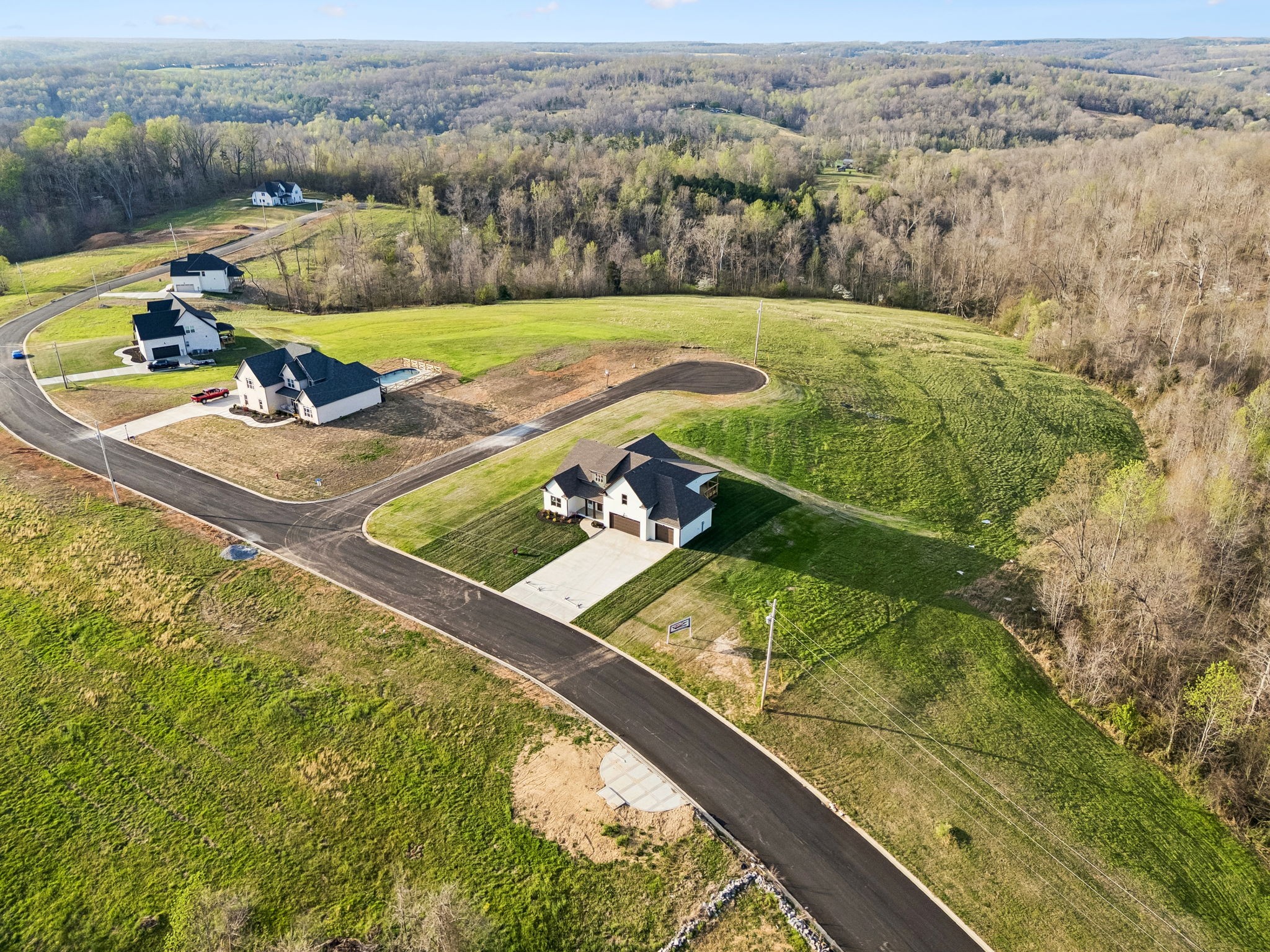 1015 Linder Ridge Road Woodlawn, TN 37191 - Photo 52 of 55 an aerial view of a house with a big yard