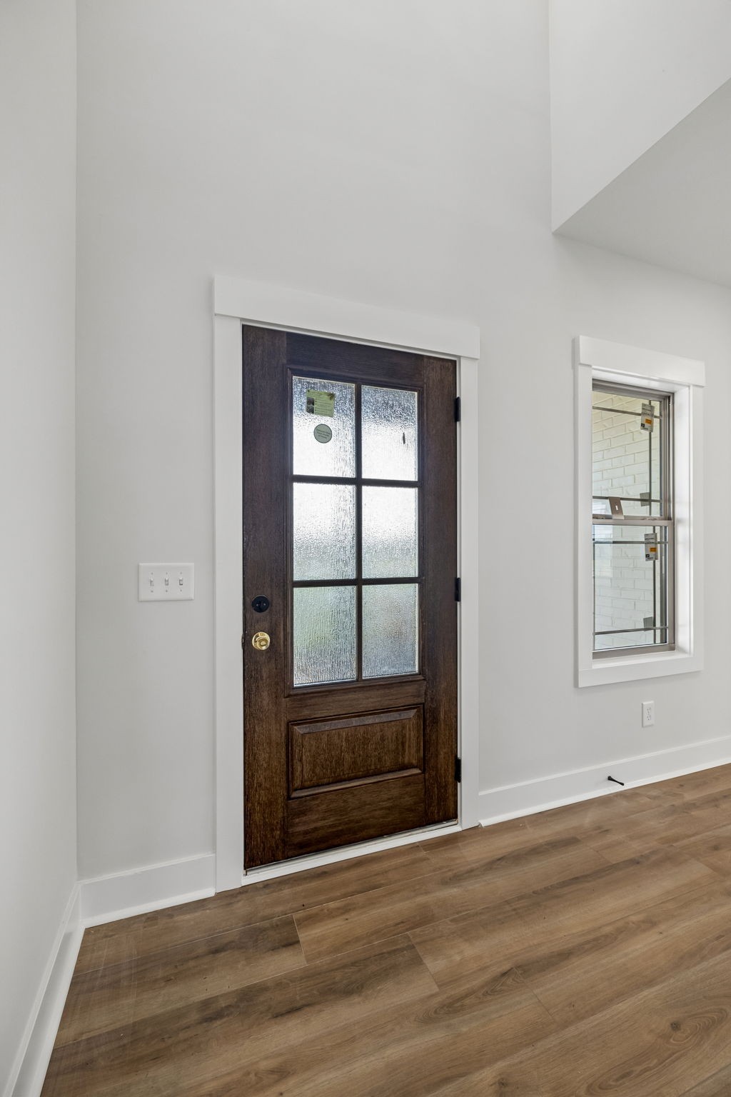 1015 Linder Ridge Road Woodlawn, TN 37191 - Photo 6 of 55 a view of wooden floor and windows in a room