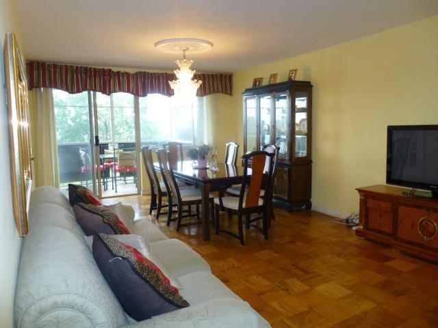 50 Glenbrook Road, Unit 6J Stamford, CT 06902 - Photo 1 of 1 a view of a dining room with furniture window and outside view