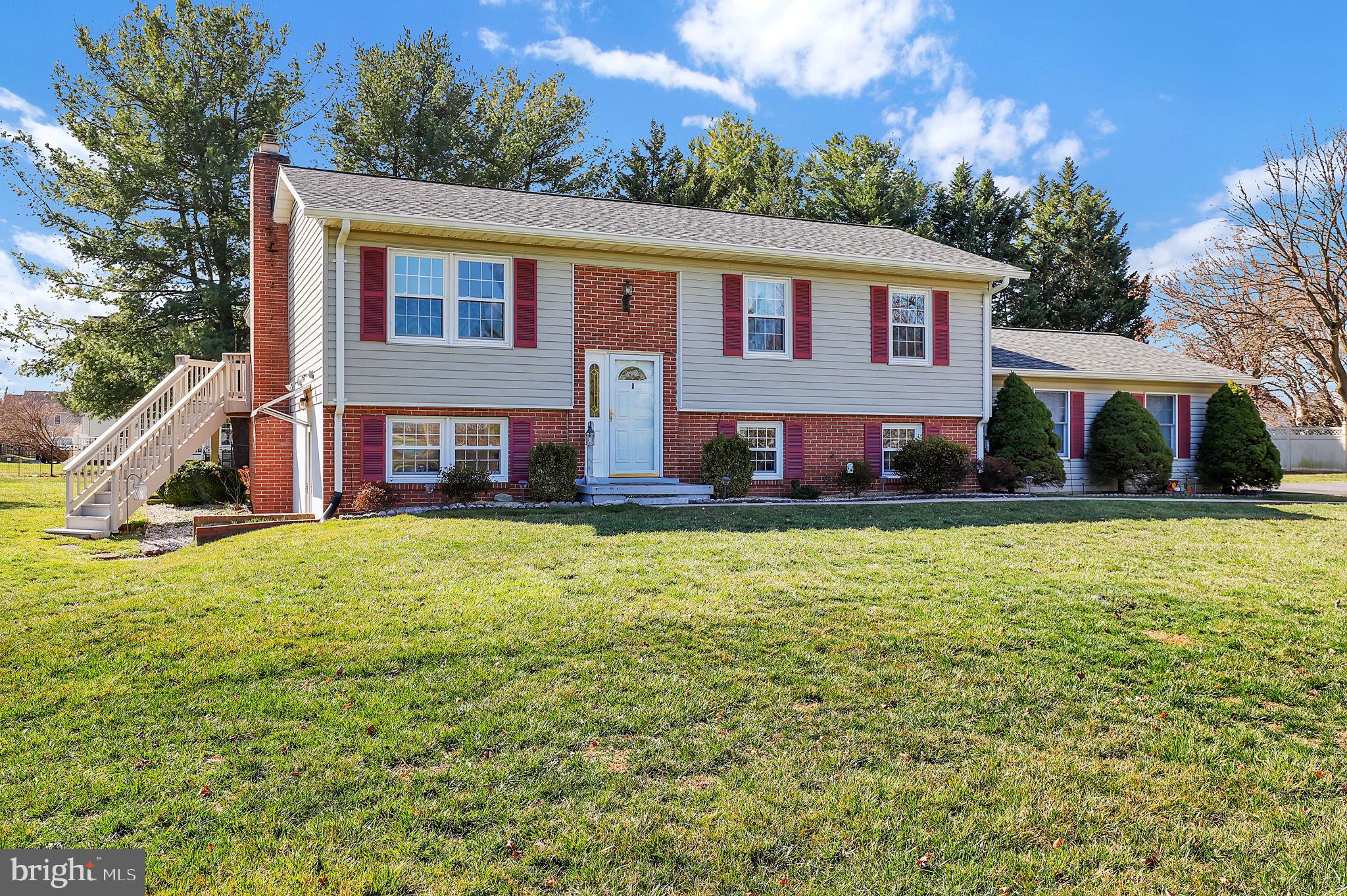 5709 Adamstown Road Adamstown, MD 21710 - Photo 1 of 42 a front view of house with yard and seating area