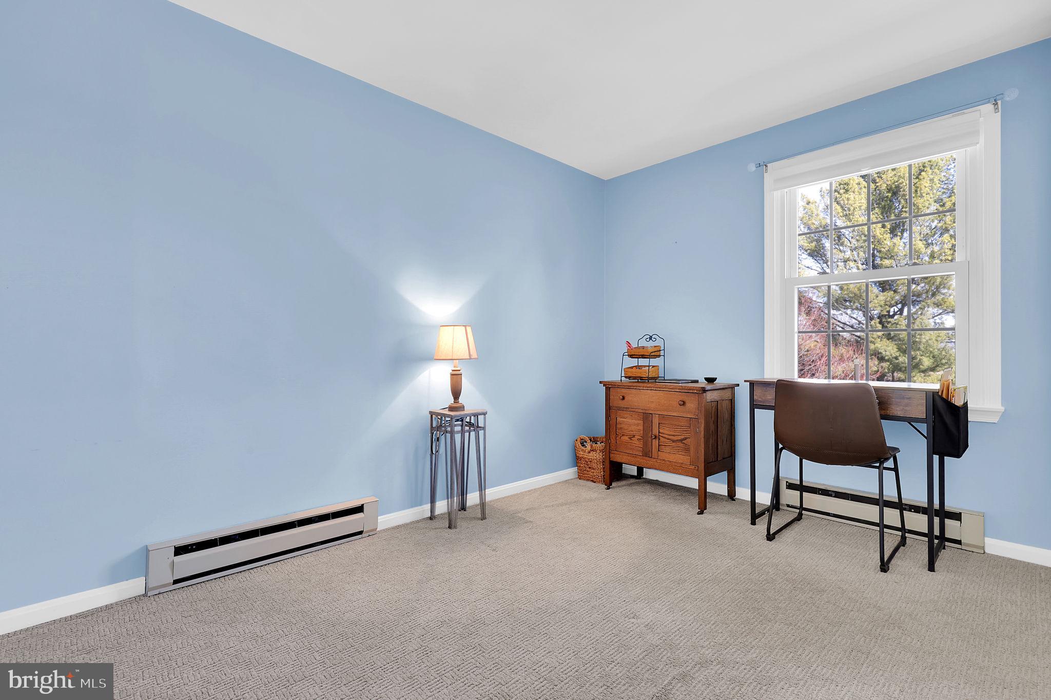 5709 Adamstown Road Adamstown, MD 21710 - Photo 17 of 42 a bedroom with furniture and a window