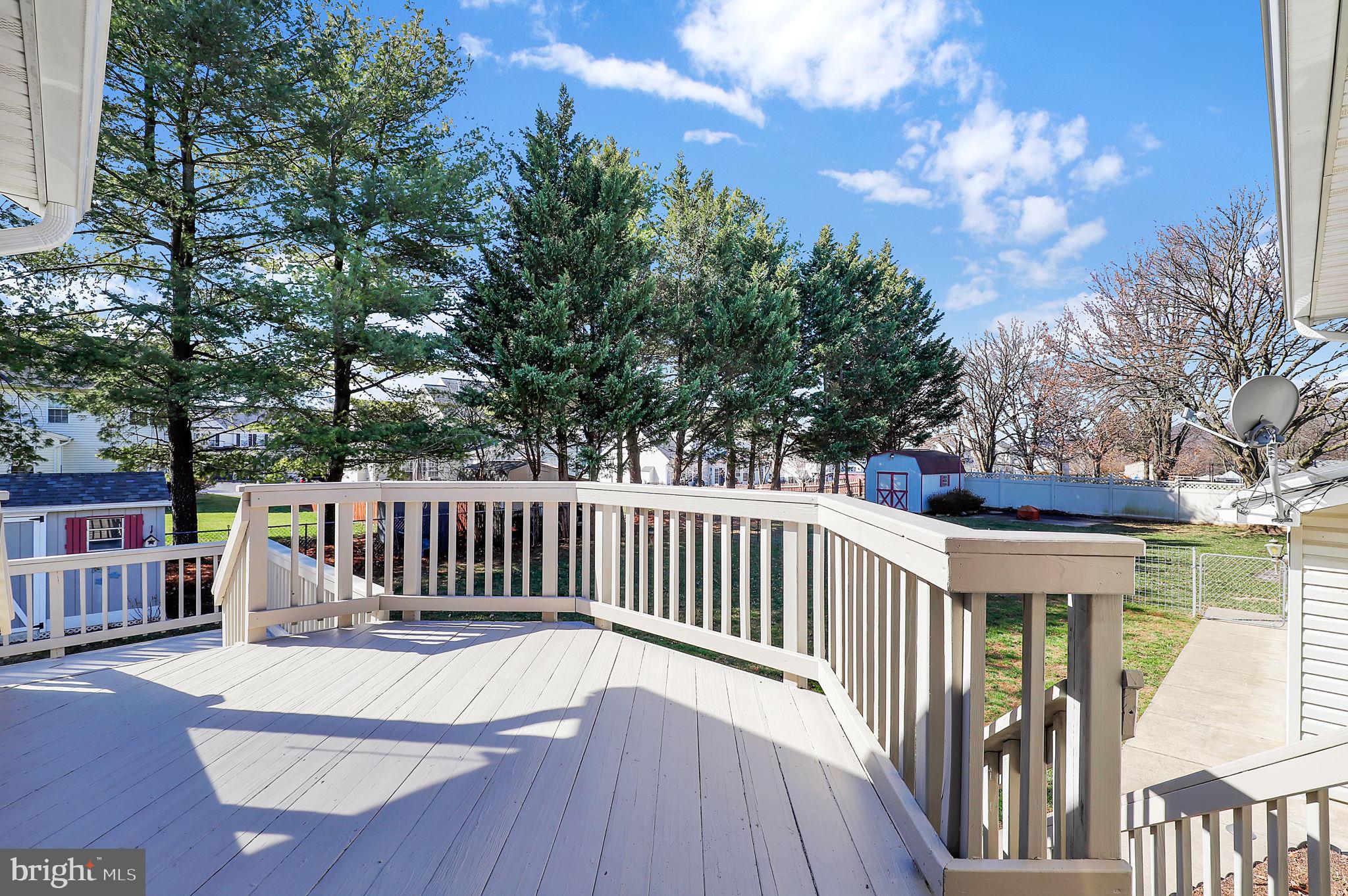 5709 Adamstown Road Adamstown, MD 21710 - Photo 30 of 42 a view of balcony with wooden floor and fence
