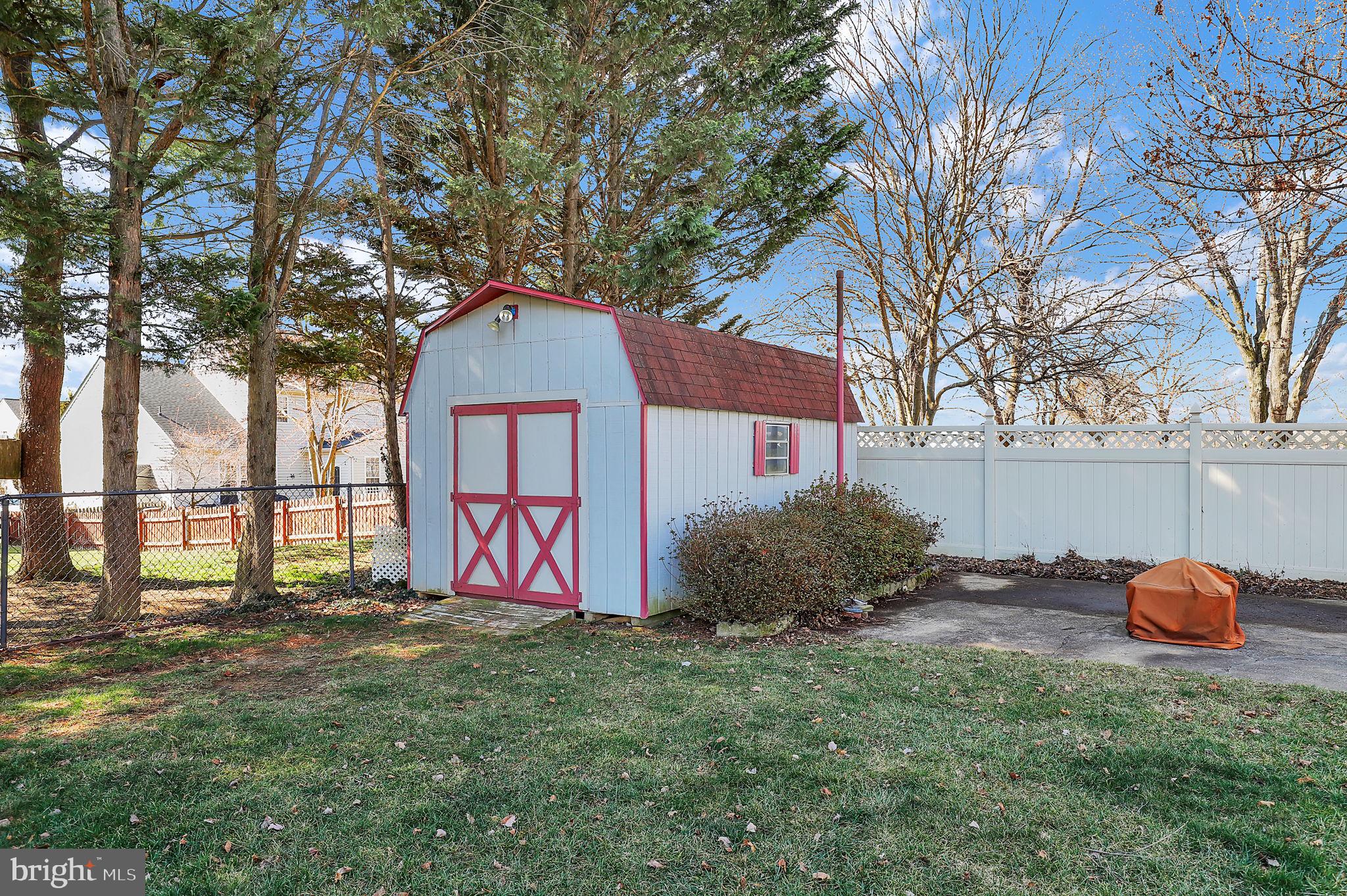 5709 Adamstown Road Adamstown, MD 21710 - Photo 33 of 42 a backyard of a house with lots of green space