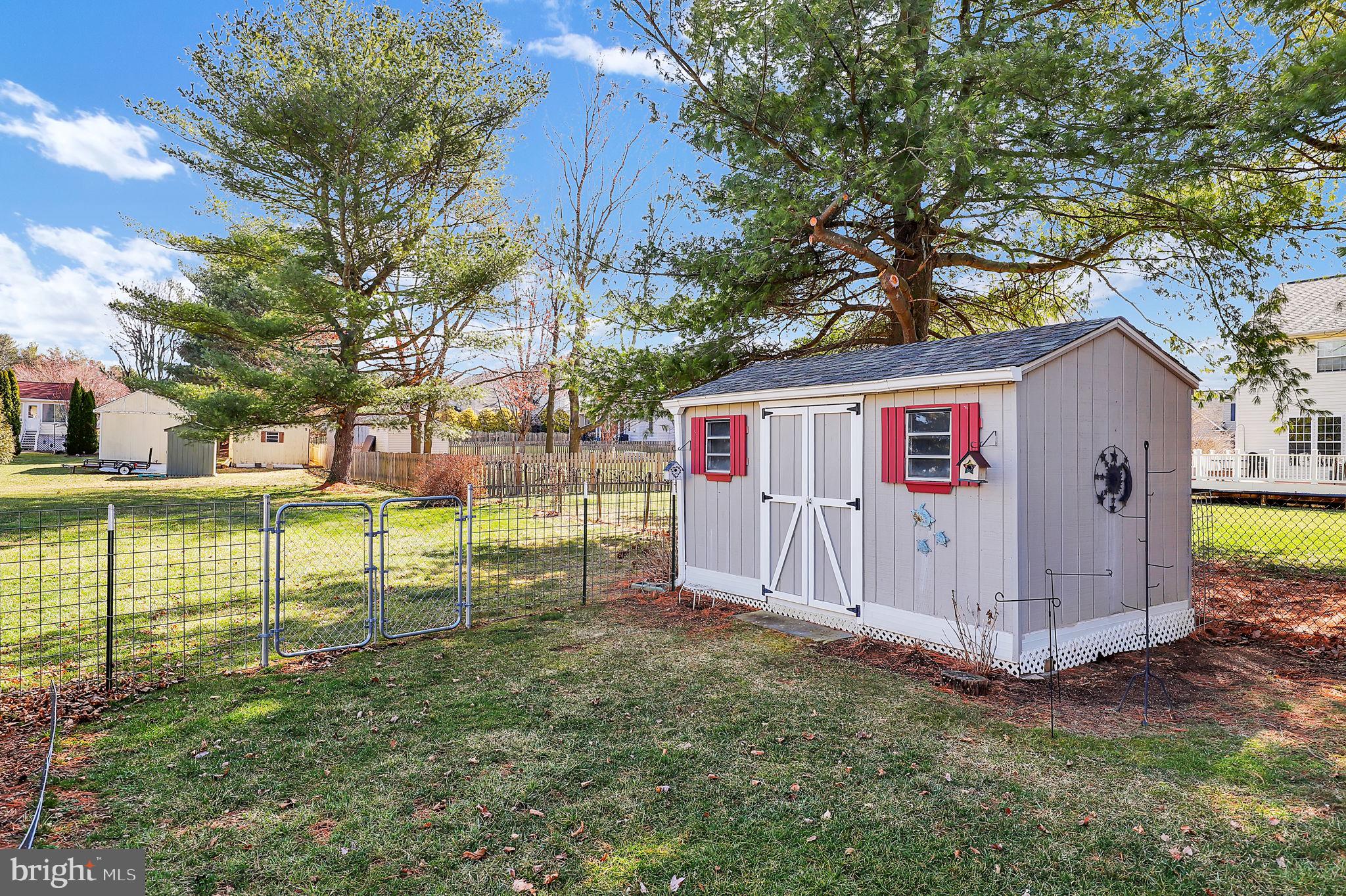5709 Adamstown Road Adamstown, MD 21710 - Photo 34 of 42 a view of a house with backyard and a tree