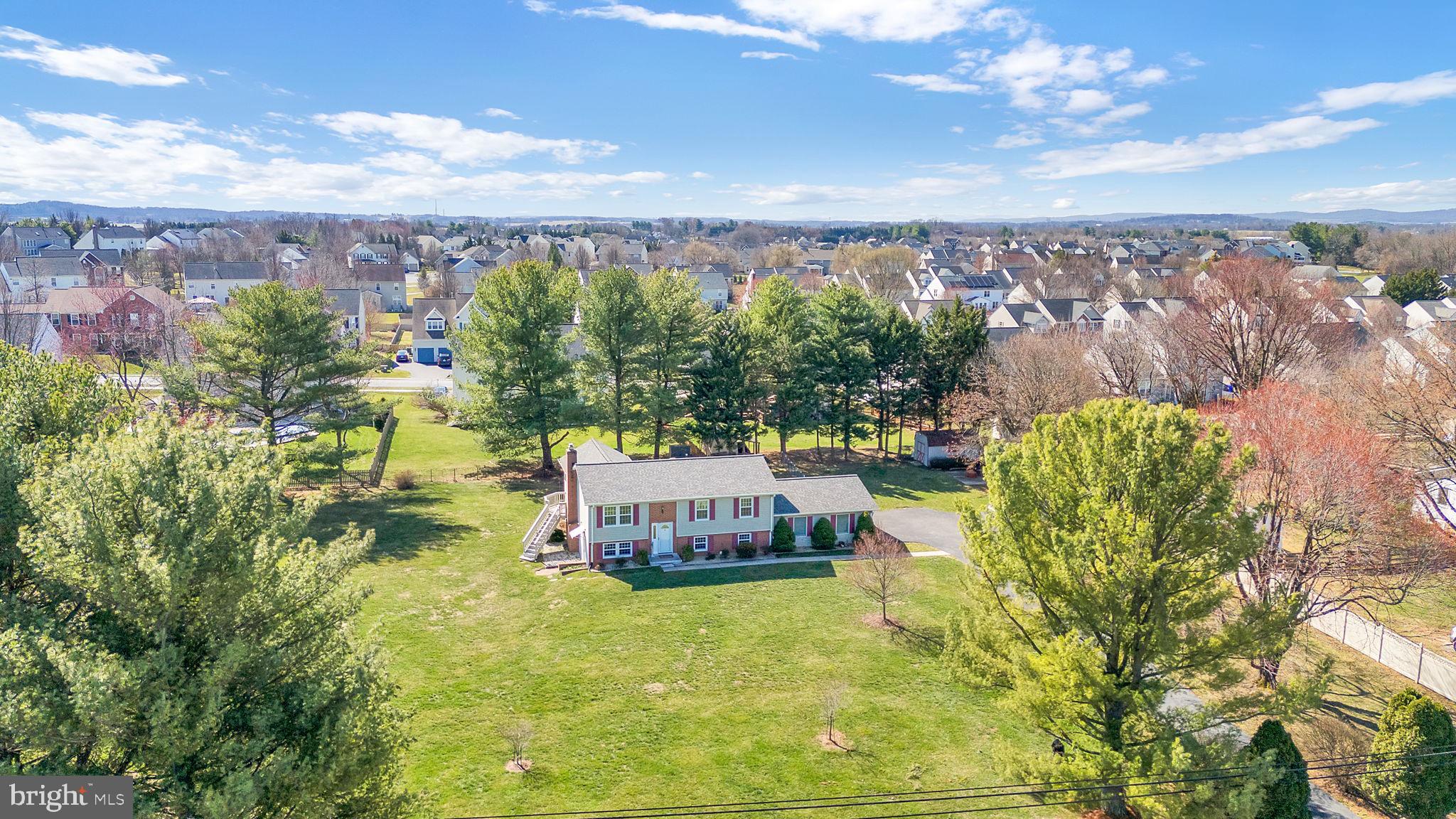 5709 Adamstown Road Adamstown, MD 21710 - Photo 38 of 42 a view of a swimming pool with a yard