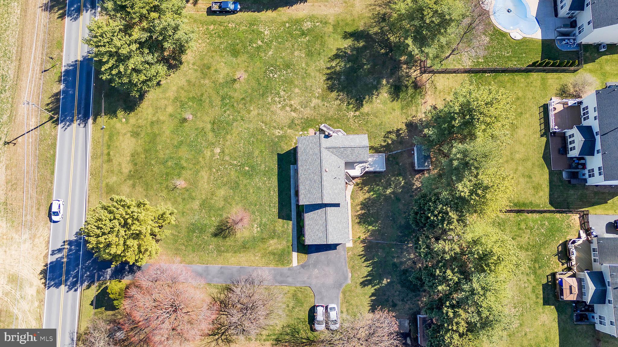 5709 Adamstown Road Adamstown, MD 21710 - Photo 40 of 42 an aerial view of residential houses with outdoor space