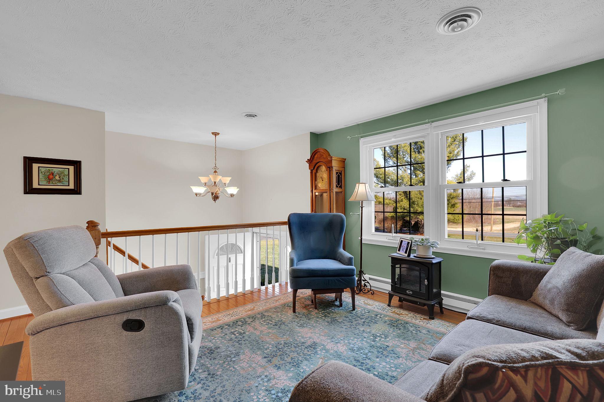 5709 Adamstown Road Adamstown, MD 21710 - Photo 4 of 42 a living room with furniture and a window