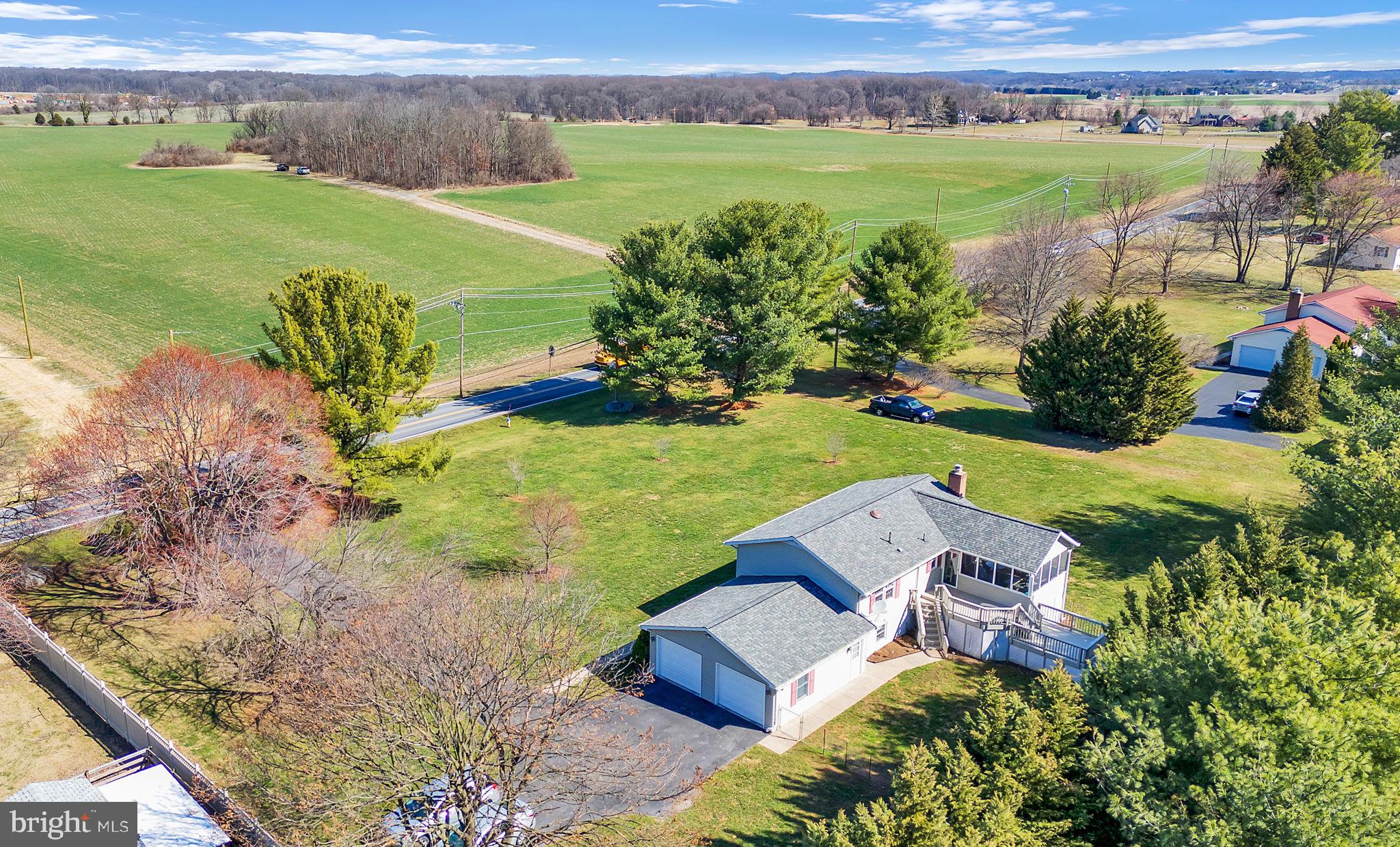 5709 Adamstown Road Adamstown, MD 21710 - Photo 41 of 42 a view of a house with a yard