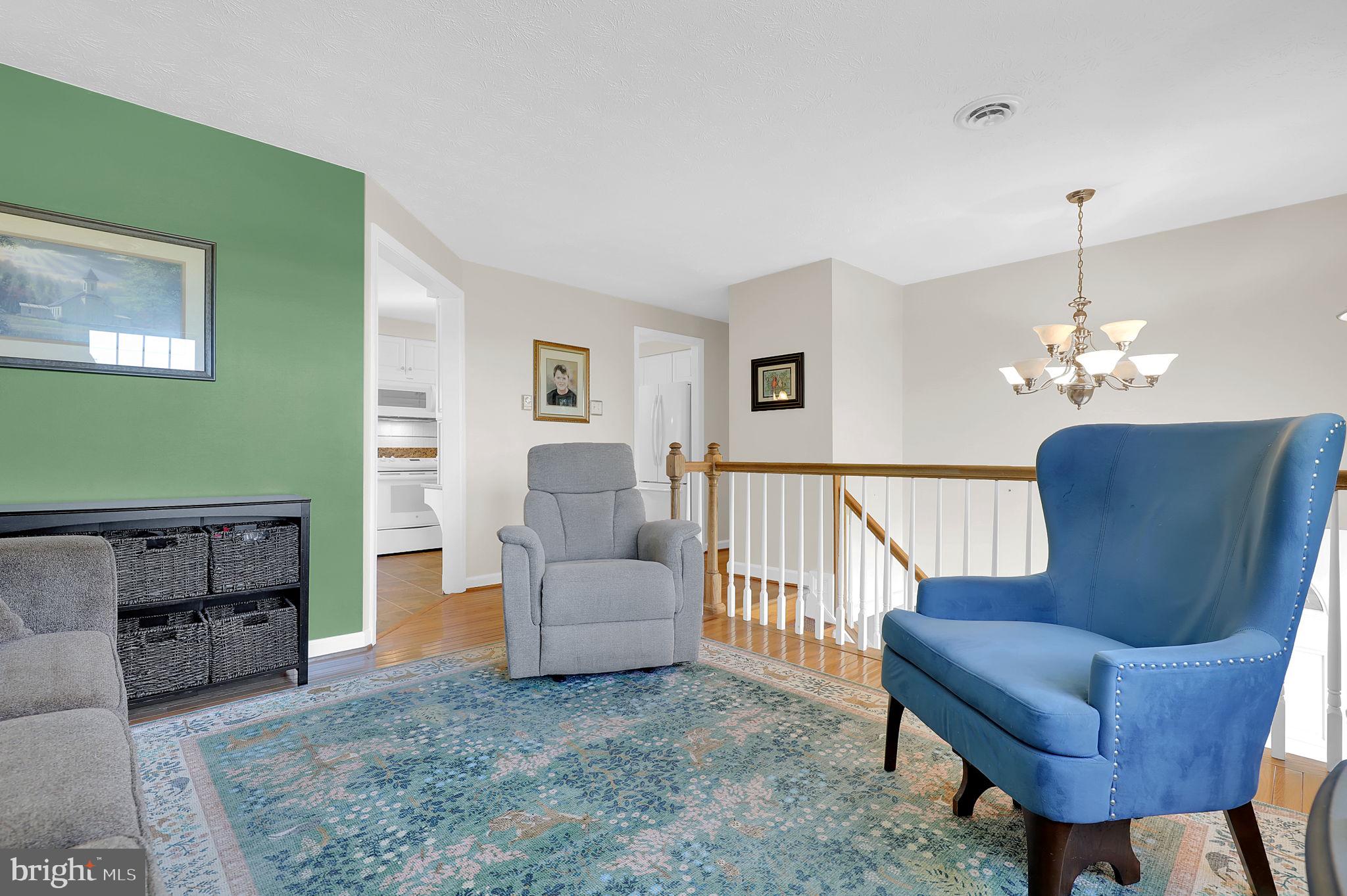 5709 Adamstown Road Adamstown, MD 21710 - Photo 6 of 42 a view of a livingroom with furniture and a couch