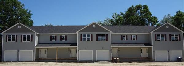 90 Rangeway Road, Unit 301 Billerica, MA 01862 - Photo 22 of 22 a front view of a house with a yard