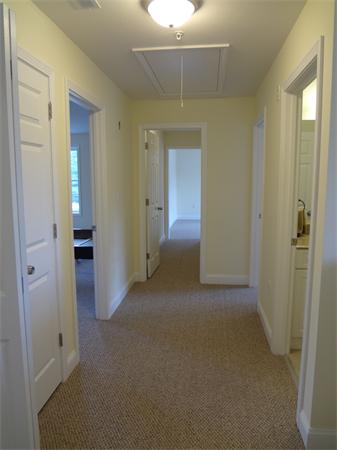 90 Rangeway Road, Unit 301 Billerica, MA 01862 - Photo 7 of 22 wooden floor and closet in a room
