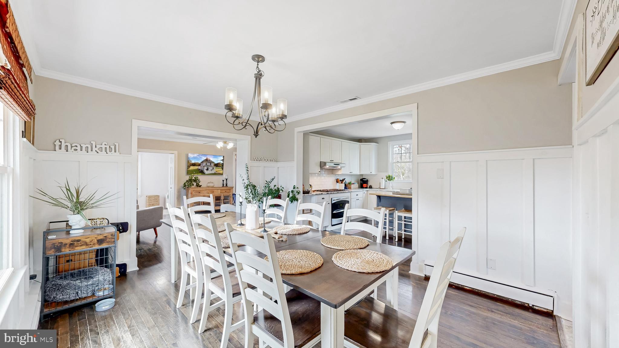 226 Bowers Beach Road Frederica, DE 19946 - Photo 15 of 46 a view of a dining room with furniture and wooden floor