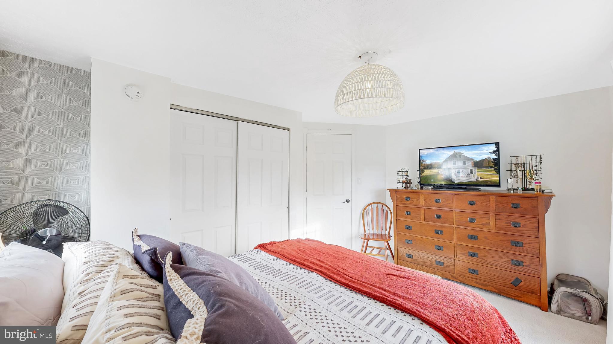 226 Bowers Beach Road Frederica, DE 19946 - Photo 29 of 46 a bedroom with a bed and a window