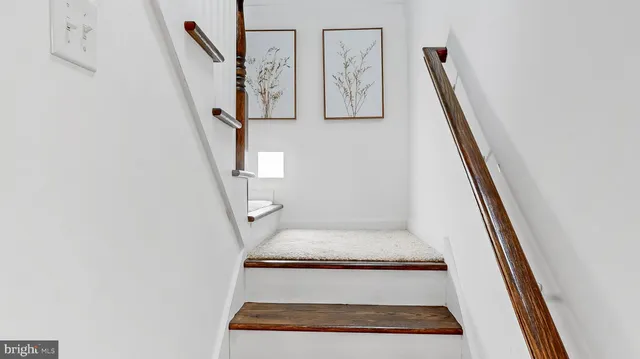 a bedroom with a bed and ceiling fan