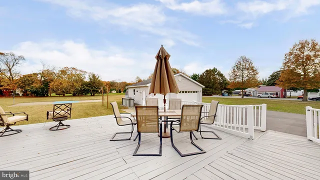 a view of a backyard of the house