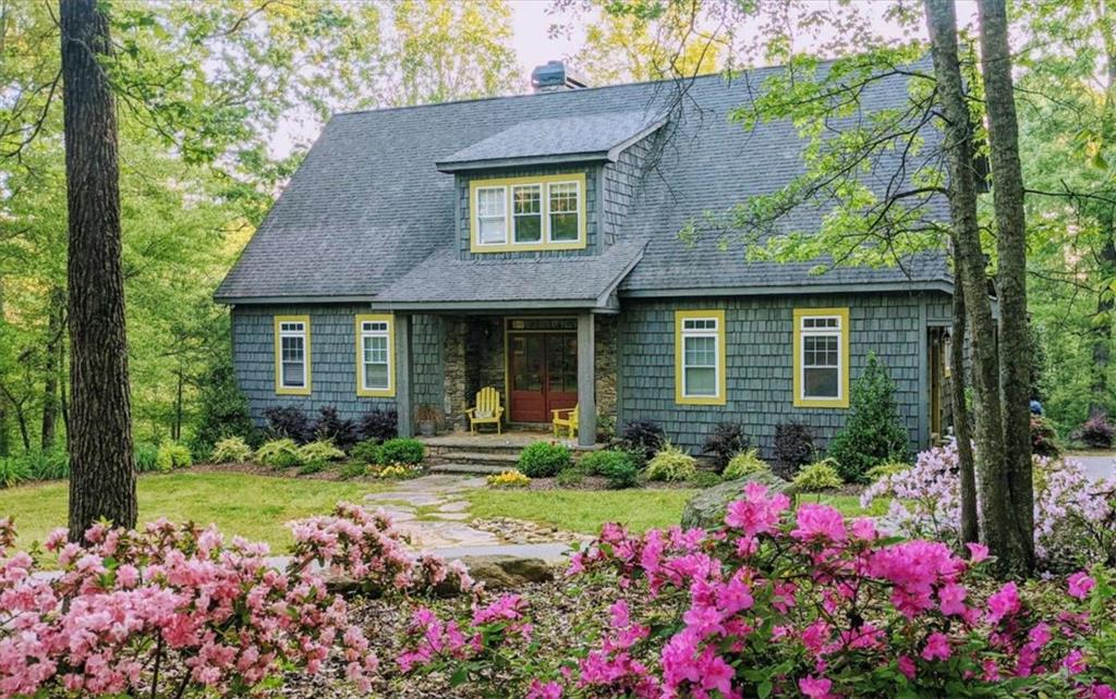 325 Loy's Farm Road Athens, GA 30605 - Photo 1 of 1 a front view of a house with a yard and fountain