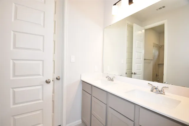 an empty room with a empty space and a window