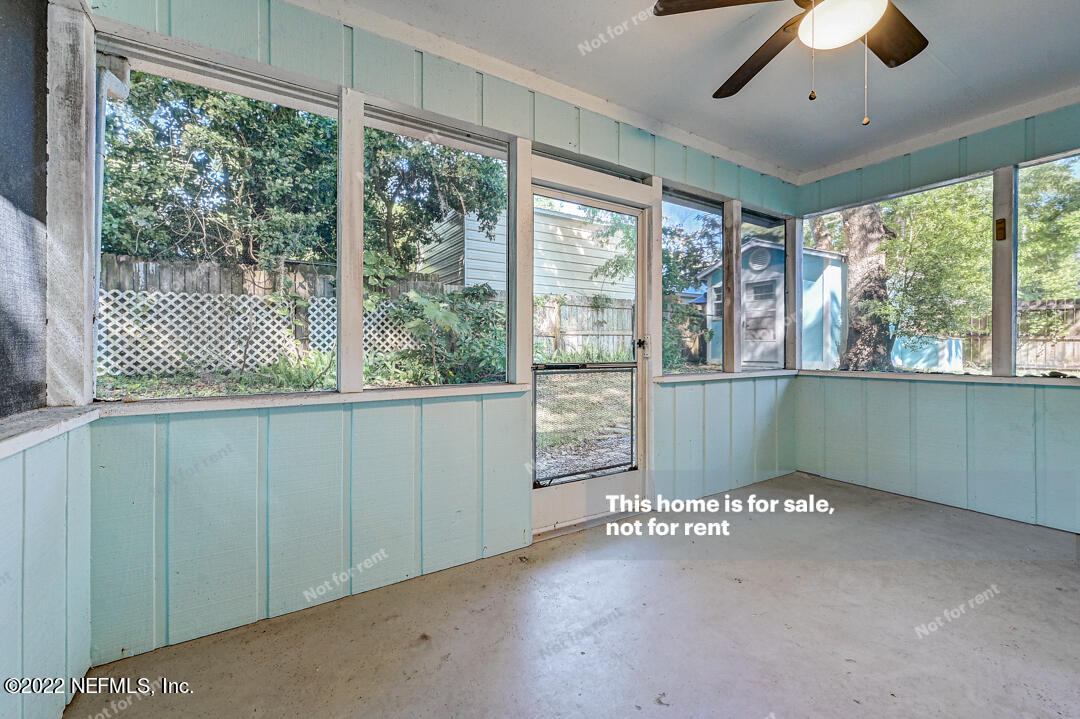 416 Shamrock Road St. Augustine, FL 32086 - Photo 16 of 29 a view of an empty room with a window
