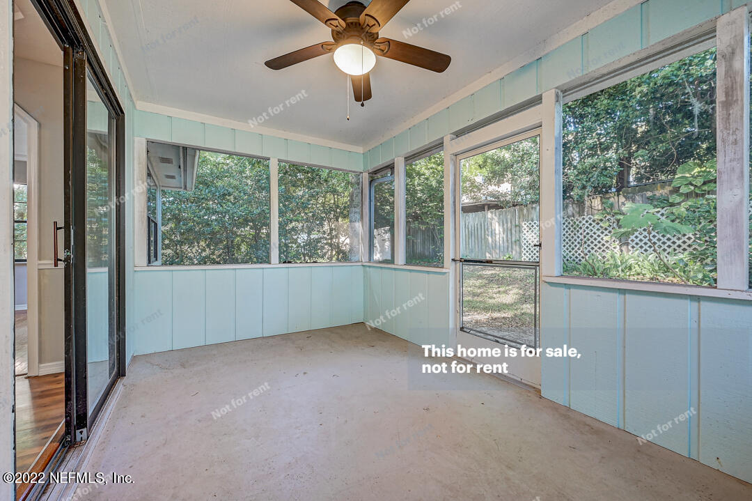 416 Shamrock Road St. Augustine, FL 32086 - Photo 17 of 29 a view of an empty room with a window