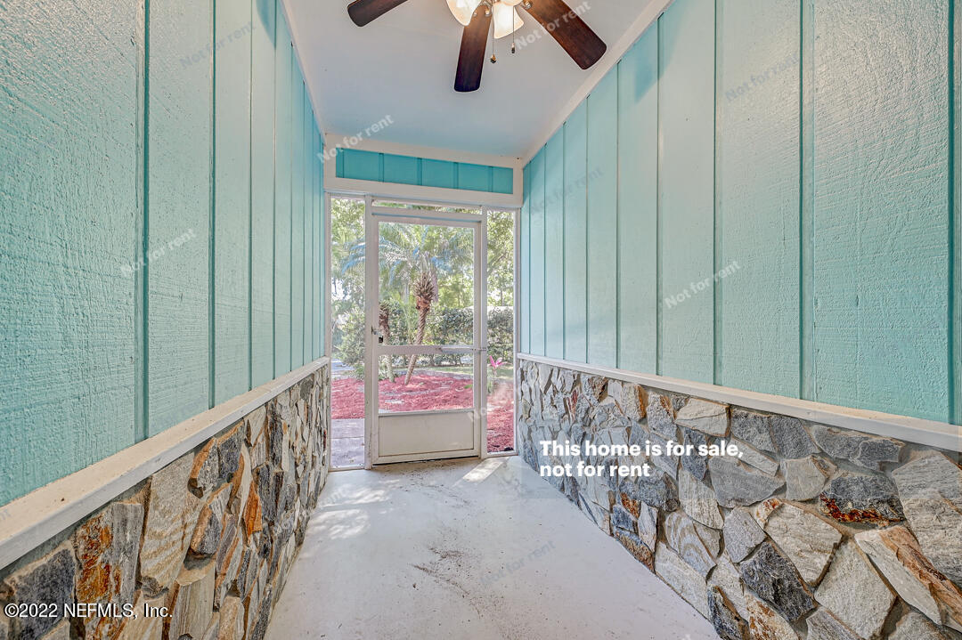 416 Shamrock Road St. Augustine, FL 32086 - Photo 22 of 29 a view of an entryway with a window