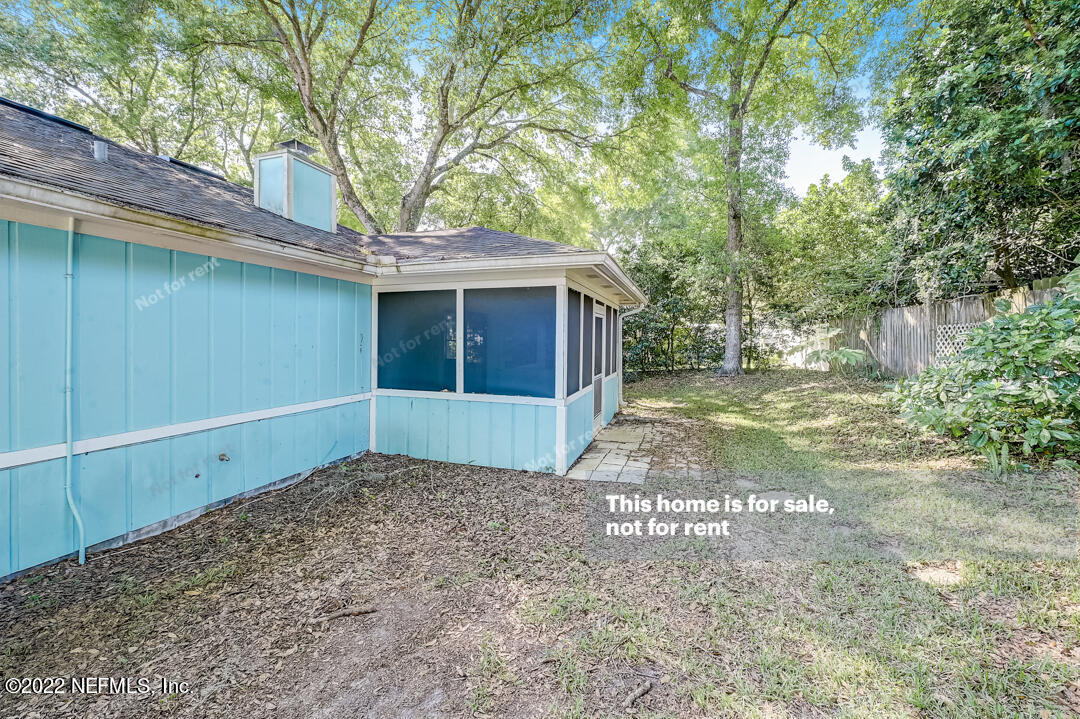 416 Shamrock Road St. Augustine, FL 32086 - Photo 26 of 29 a view of a house with a yard