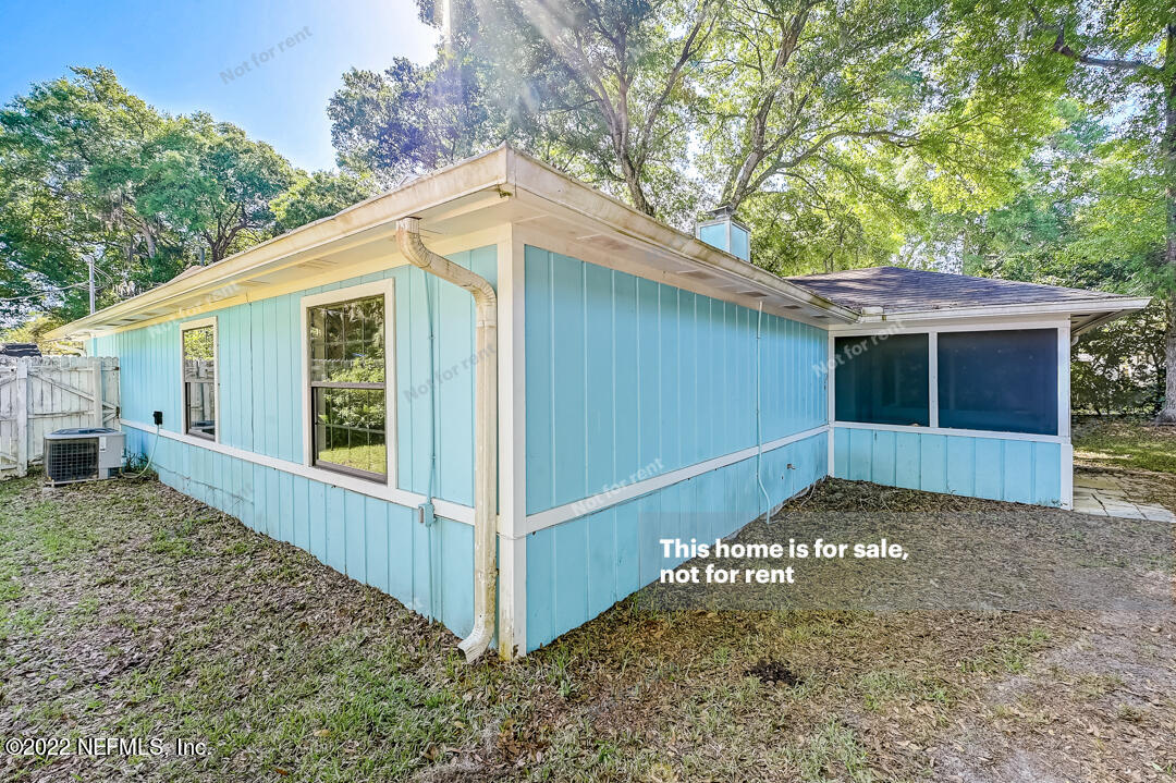 416 Shamrock Road St. Augustine, FL 32086 - Photo 27 of 29 a view of a house with a yard