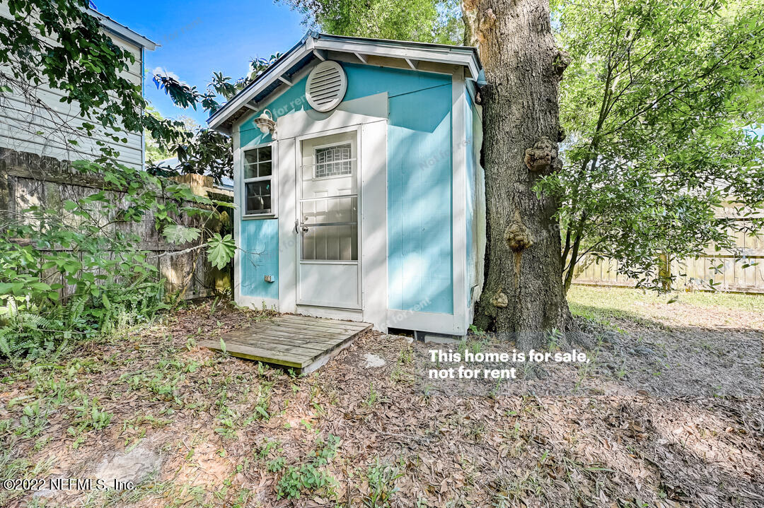 416 Shamrock Road St. Augustine, FL 32086 - Photo 29 of 29 a backyard of a house with lots of green space