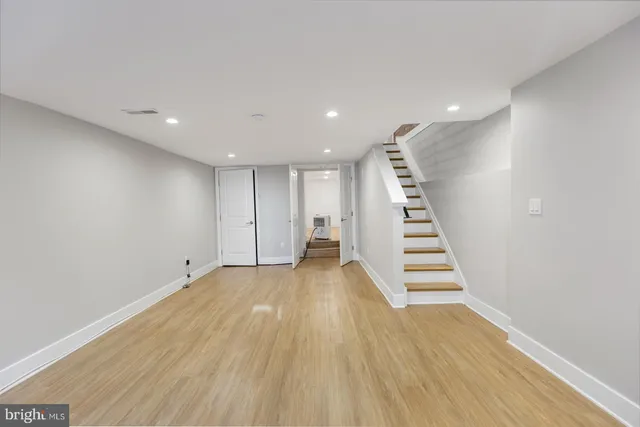 a view of entryway with wooden floor