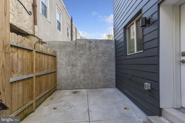 a view of wooden door and stairs