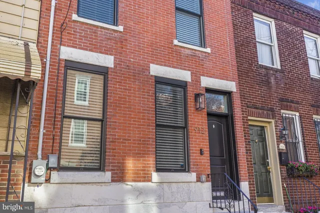 a car parked in front of a building