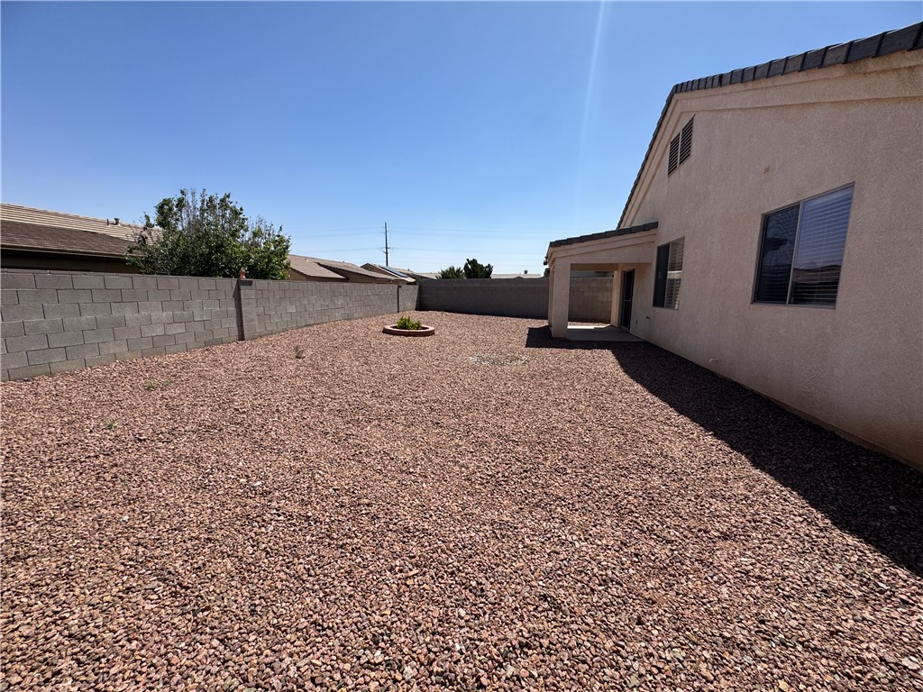 4263 East Medicine Bend Road Kingman, AZ 86401 - Photo 14 of 14 a view of a backyard of the house