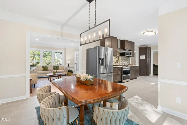 a en suite bathroom with a tub and a large mirror