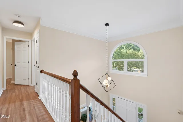 a view of a house with backyard and porch