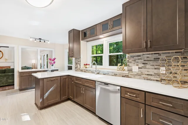 a black and white photo of a bench