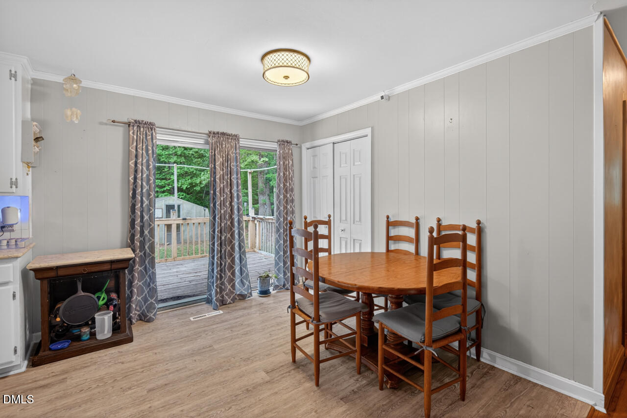 1420 Goodwin Road Durham, NC 27712 - Photo 11 of 54 a dining room with furniture and window