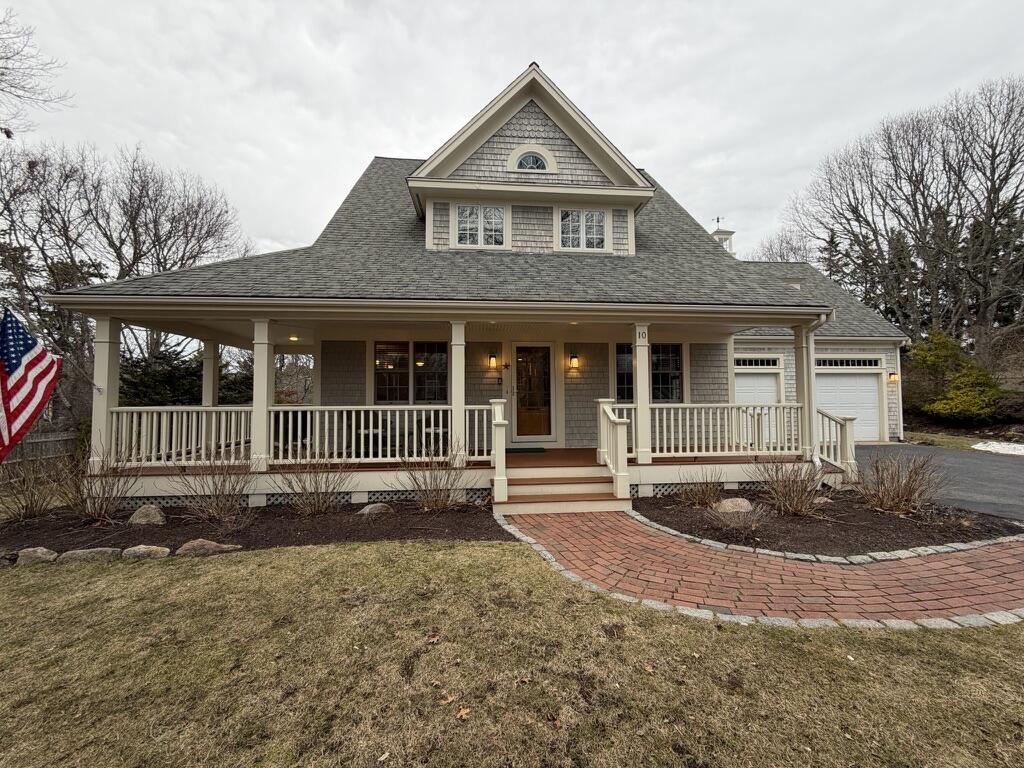 10 Abbey Gate Road Cotuit, MA 02635 - Photo 67 of 67 a front view of a house with a yard
