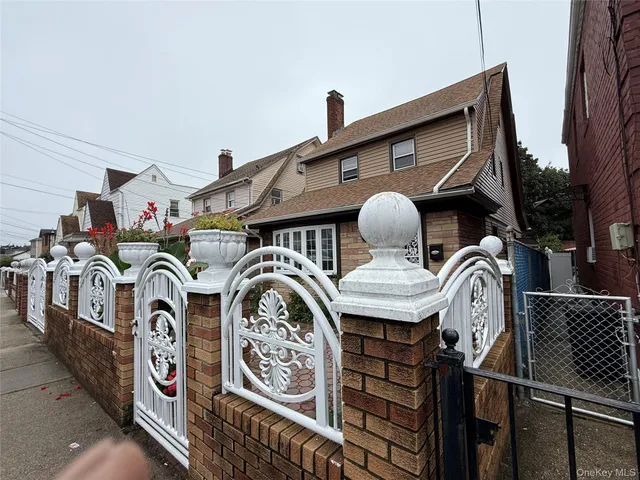 a living room with furniture a lamp and a fireplace