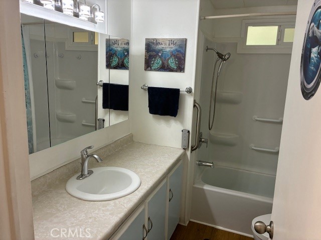 34480 County Line Road, Unit 19 Yucaipa, CA 92399 - Photo 4 of 10 a bathroom with a granite countertop sink toilet and shower