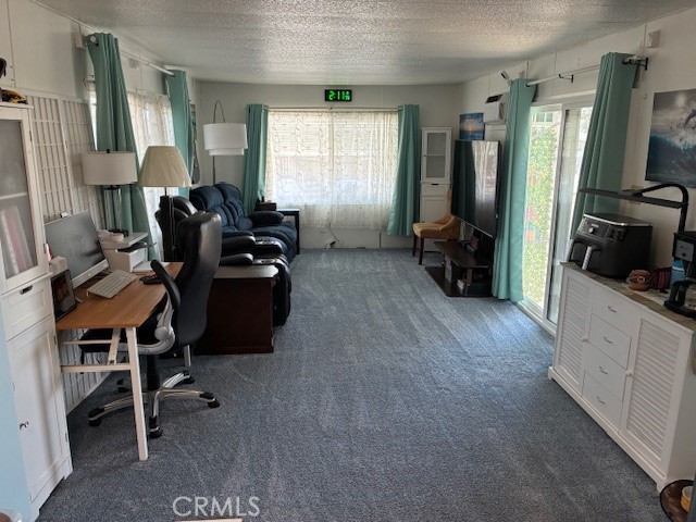 34480 County Line Road, Unit 19 Yucaipa, CA 92399 - Photo 6 of 10 a view of a workspace with furniture and a window