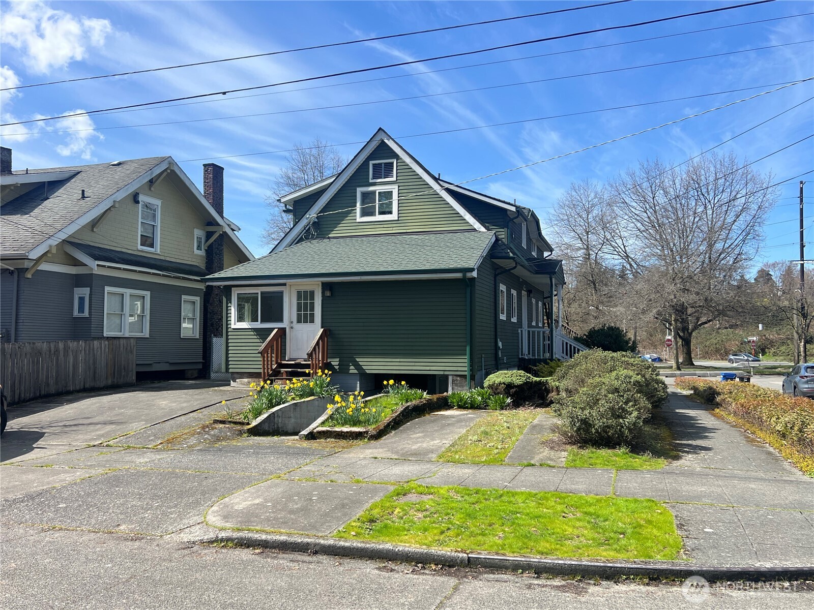 809 Northeast 62nd Street Seattle, WA 98115 - Photo 12 of 12 a front view of a house with garden